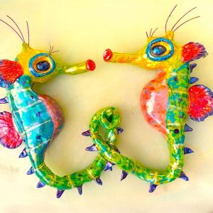 Pair of Pot-bellied Seahorses in mating dance